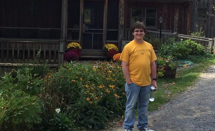 Sean O'Brien is standing on a sidewalk