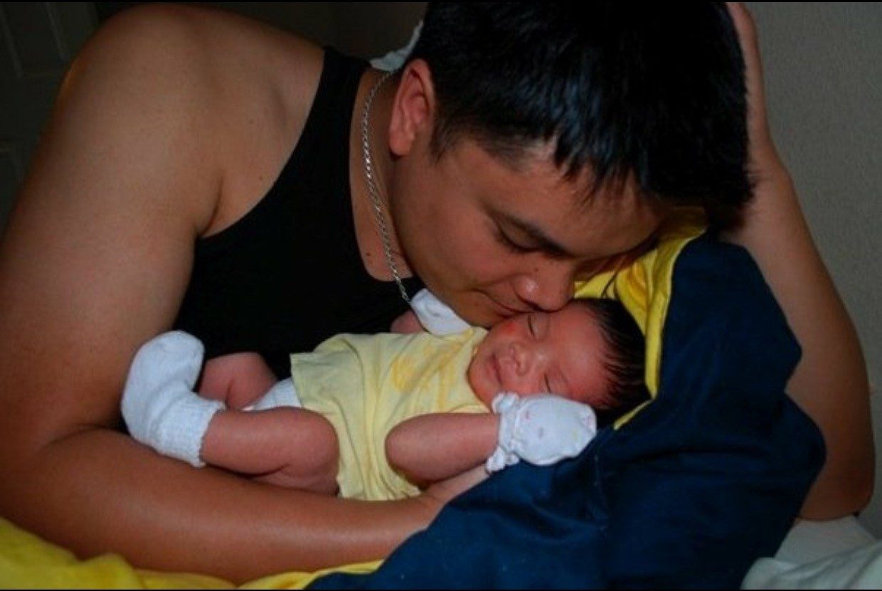 Cancerwise Blog Post: Rodney Quindoy holds his daughter Mikayla, who died of DIPG