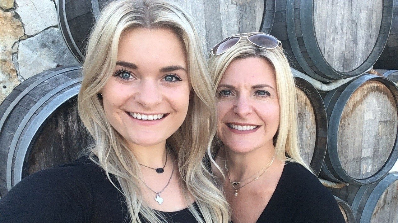 Brain tumor survivor Brooke Kotrla, left, with her mother and caregiver Deanna