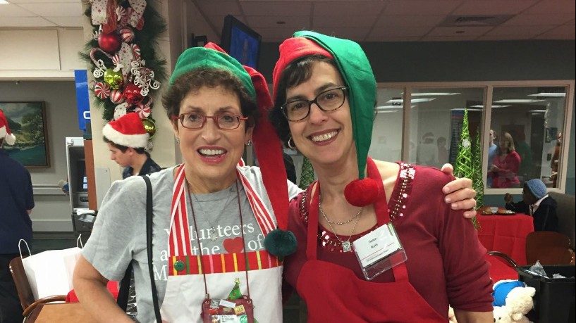 Helen Kalmans (right) with Mindy Wertheimer, director of Volunteer Services and Merchandising 