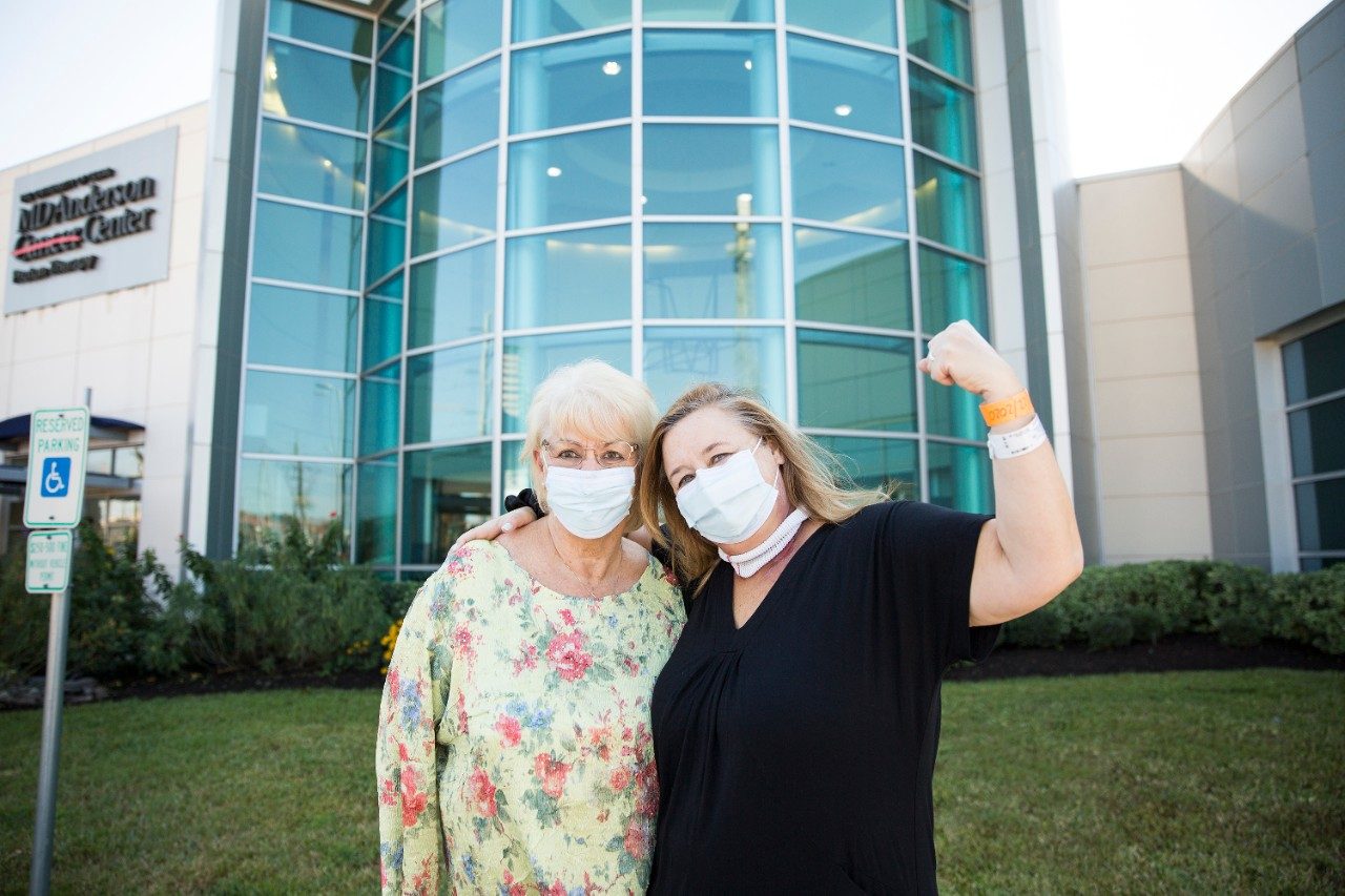 Head and neck cancer survivor Karrie Fath with her mom, Dorothy Gutowski, outside MD Anderson Proton Therapy Center