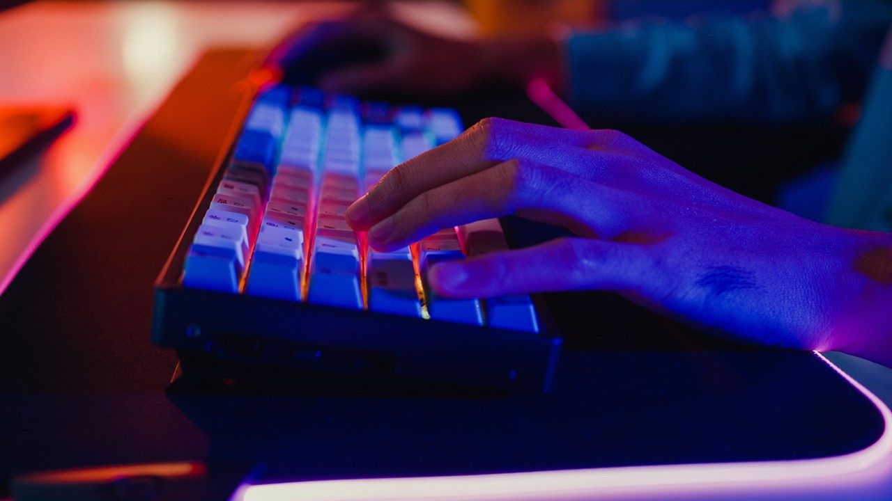 Close-up shot of hands on a keyboard