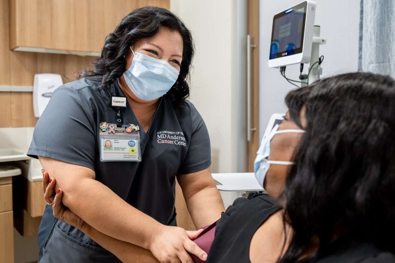 Dora Wood comforts a patient at MD Anderson Cancer Center West Houston.