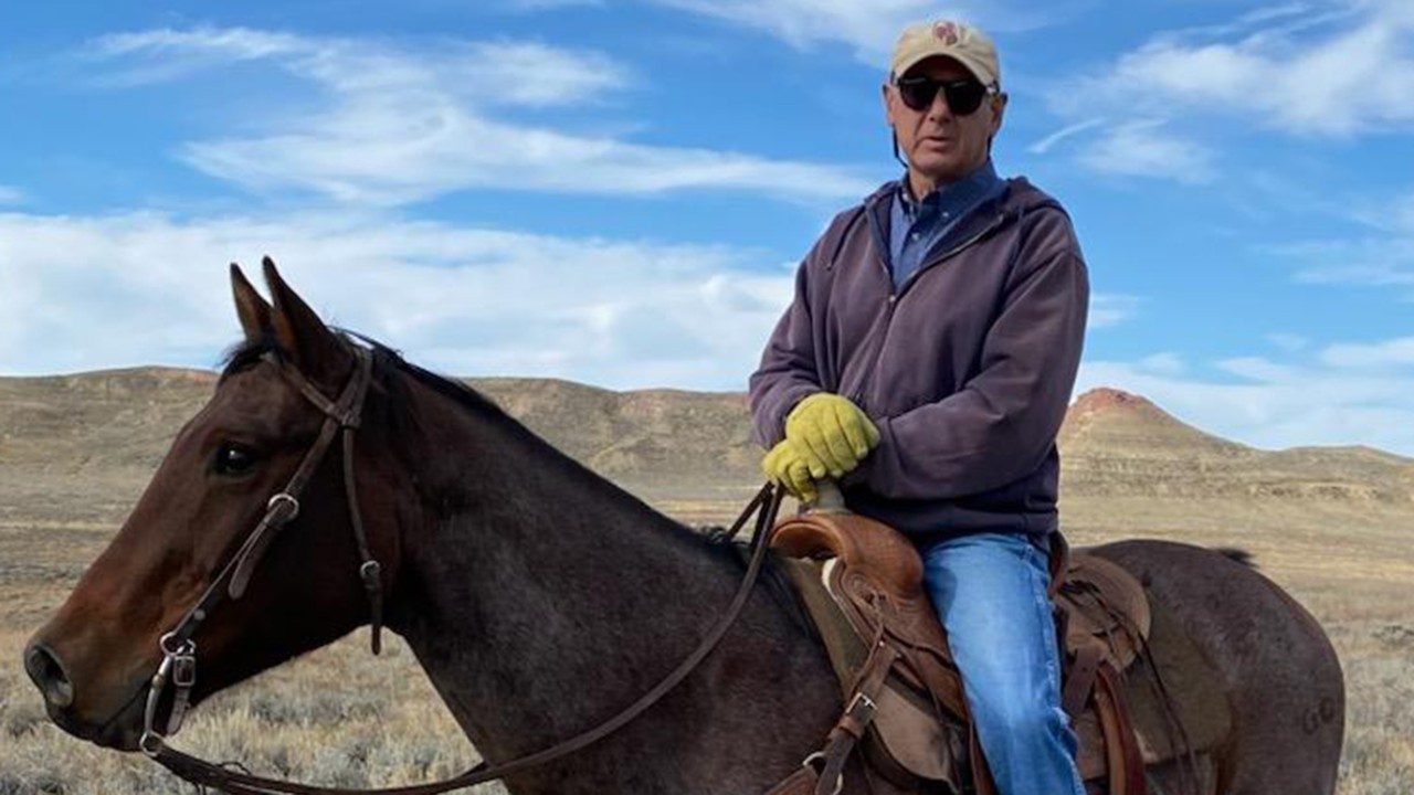 Pancreatic cancer survivor Steven Adami, in the custom-made saddle on his gelding, Wally