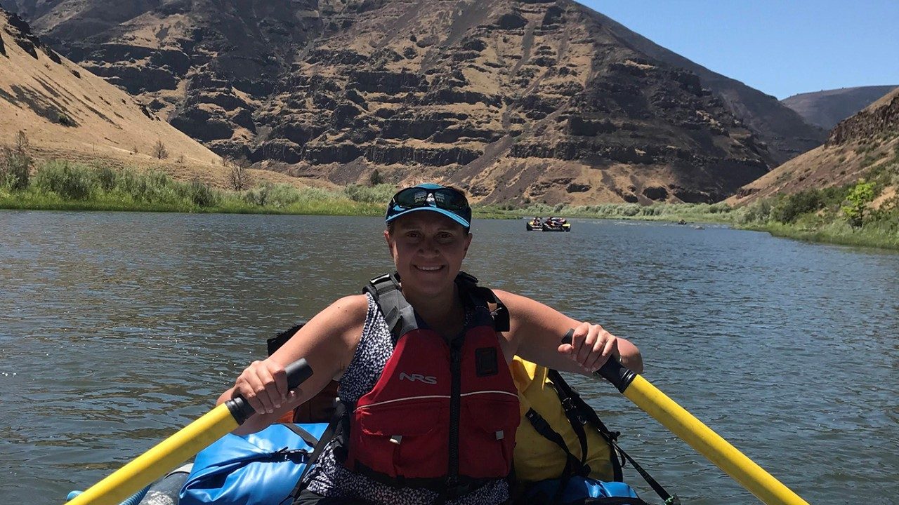 Breast cancer survivor Meagan Krupa, Ph.D., on the John Day River in Oregon in June 2018