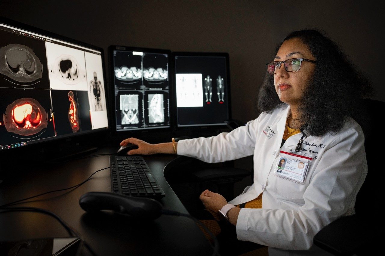 Dr. Surasi read over PSMA PET scan images.