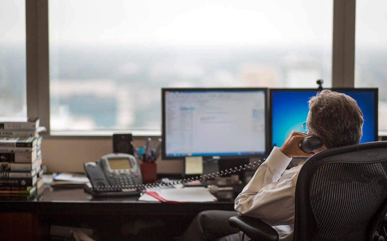 MD Anderson president Ron DePinho, M.D., at desk