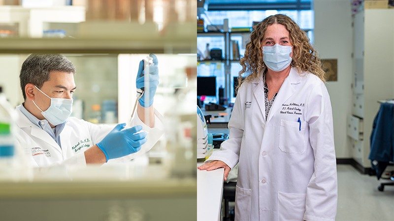 On the left, a man wearing a mask, lab coat and gloves, holds a pipette. On the right, a woman in a lab coat and mask stands next to a white counter.